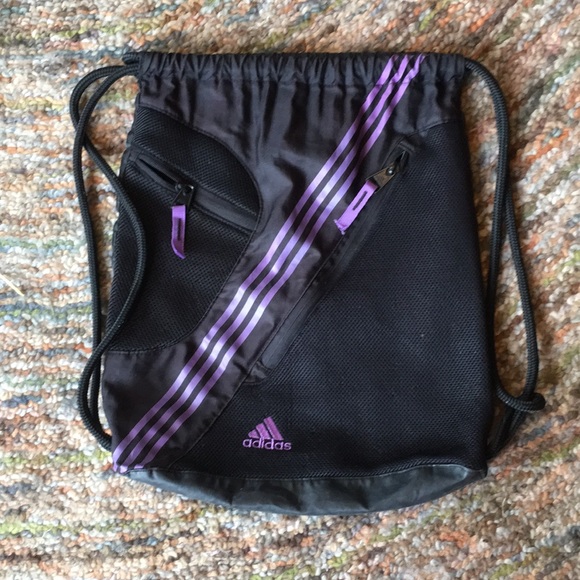 Black and purple drawstring Adidas backpack